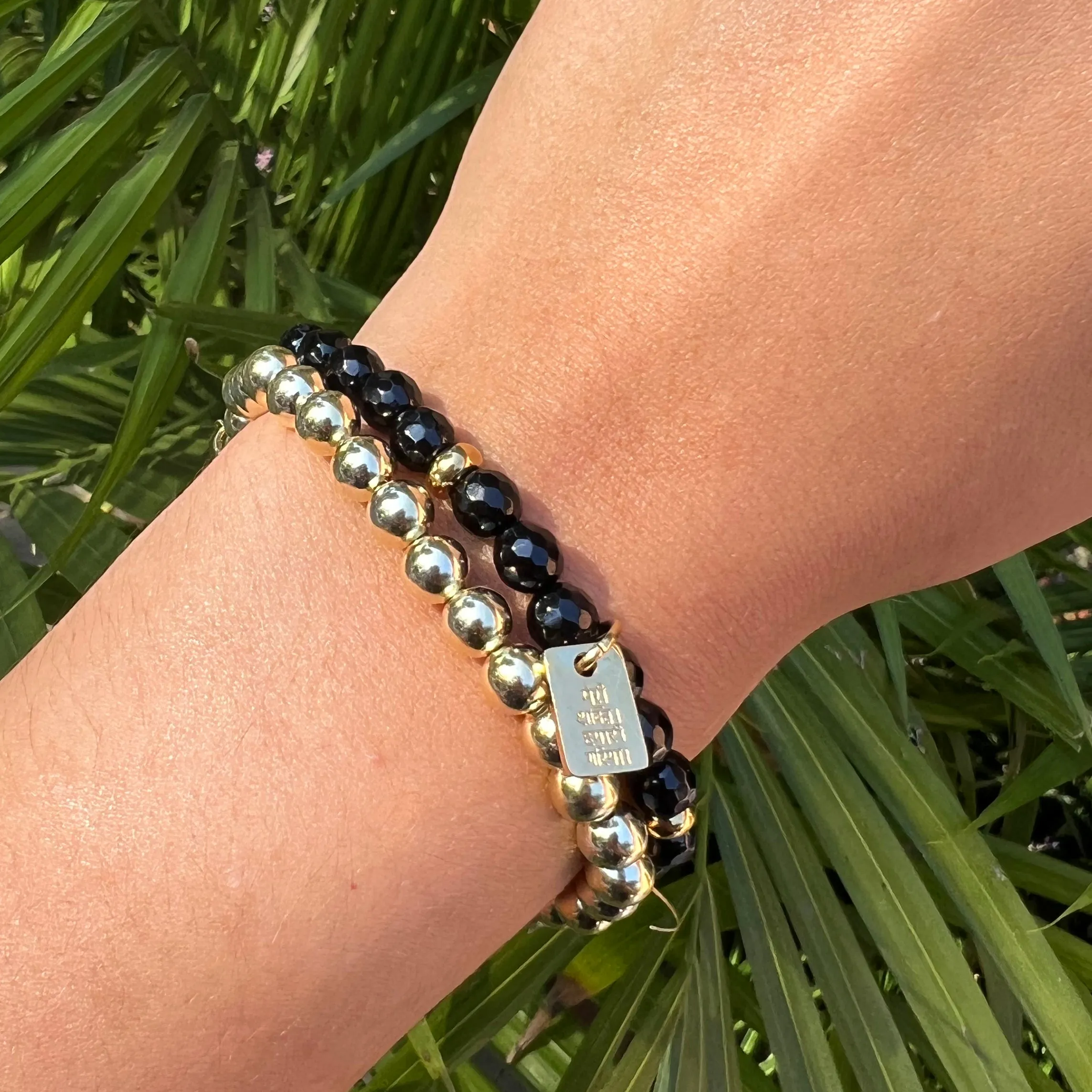 Black Onyx Restore Dignity Charm Bracelet