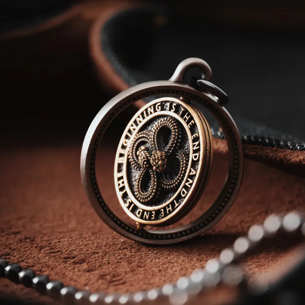 Rotatable Double Ouroboros Pendant